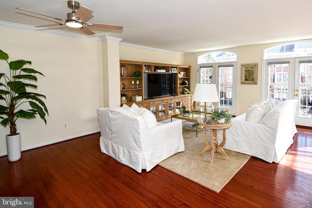 living room with ceiling fan, ornamental molding, and dark hardwood / wood-style floors