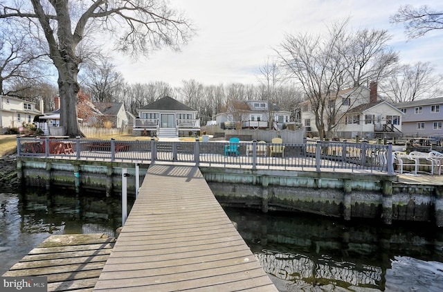 view of dock with a water view