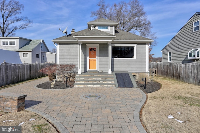 view of front of house with a patio area