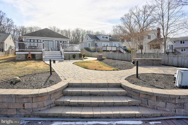 view of yard with a deck and a patio area