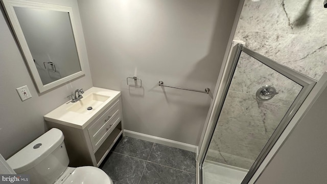 bathroom with vanity, tile patterned floors, and toilet