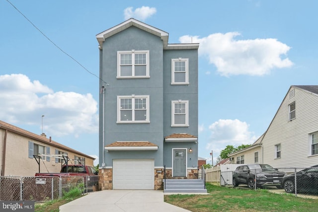 view of front of house with a garage