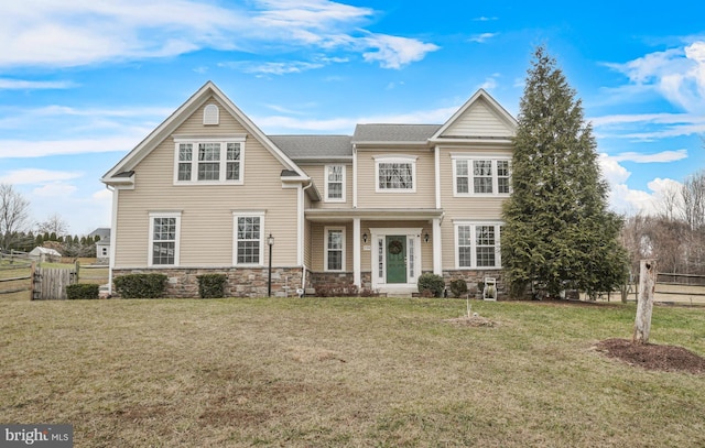 view of front facade featuring a front yard