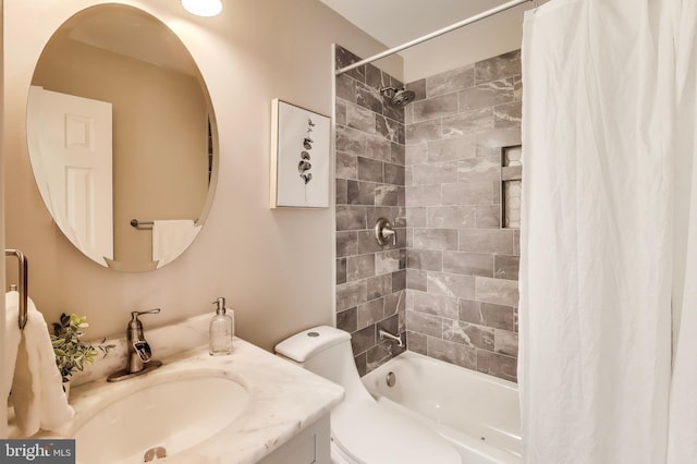 full bathroom with toilet, vanity, and shower / bath combo with shower curtain