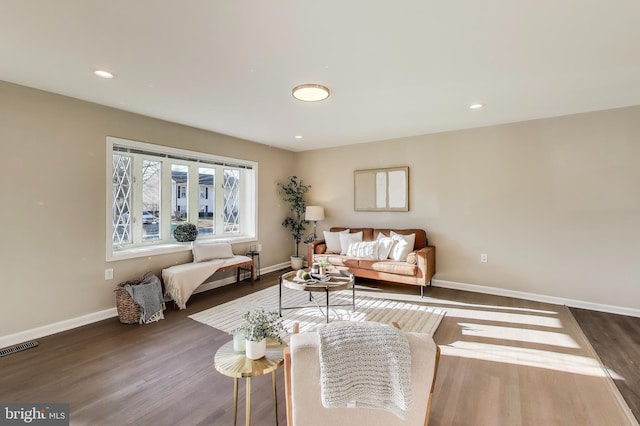 living room featuring dark hardwood / wood-style flooring