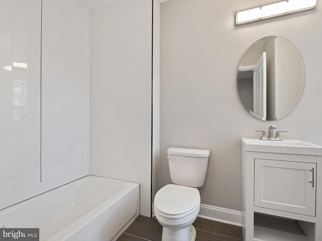 full bathroom with vanity, washtub / shower combination, and toilet