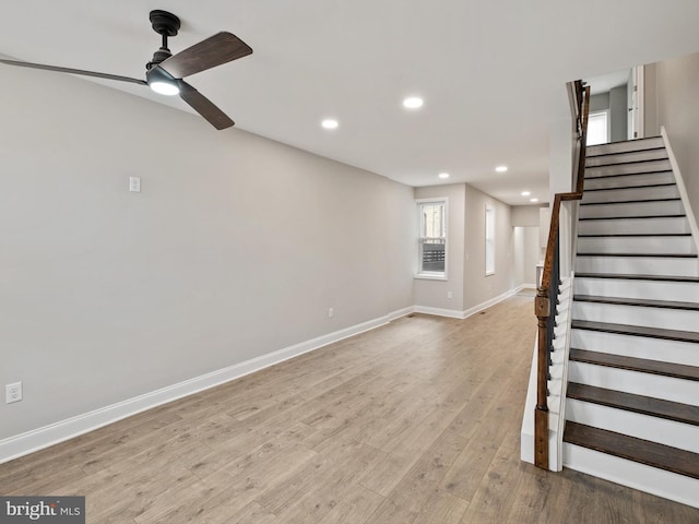 interior space featuring light hardwood / wood-style flooring and ceiling fan