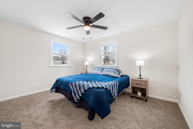 bedroom with ceiling fan and carpet