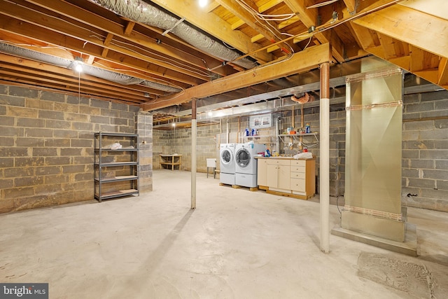 basement featuring separate washer and dryer