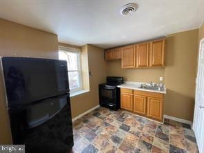 kitchen featuring black appliances