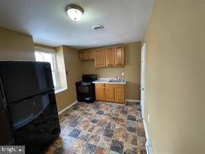 kitchen featuring black appliances