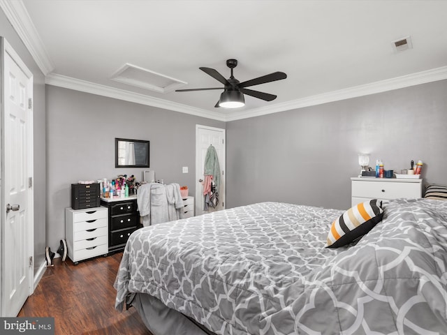 bedroom with ornamental molding, dark hardwood / wood-style floors, and ceiling fan