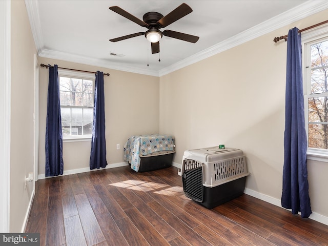 unfurnished room with dark hardwood / wood-style flooring, plenty of natural light, ornamental molding, and heating unit