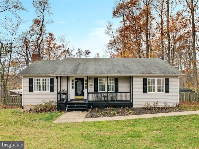 single story home with a front lawn