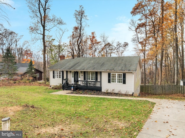 single story home with a porch and a front lawn