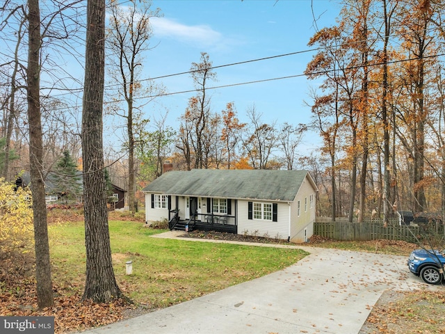 view of front of home featuring a porch and a front yard