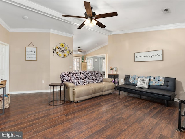 living room with dark wood-type flooring, ornamental molding, and vaulted ceiling