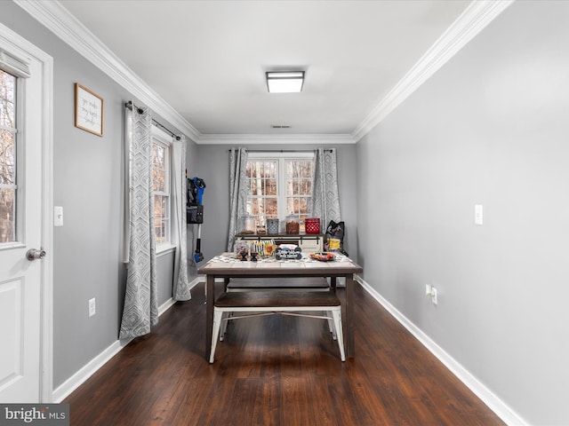 home office with ornamental molding and dark hardwood / wood-style floors