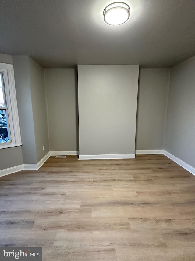 empty room featuring light hardwood / wood-style floors