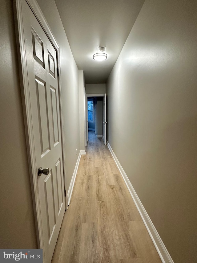 hallway featuring light hardwood / wood-style floors