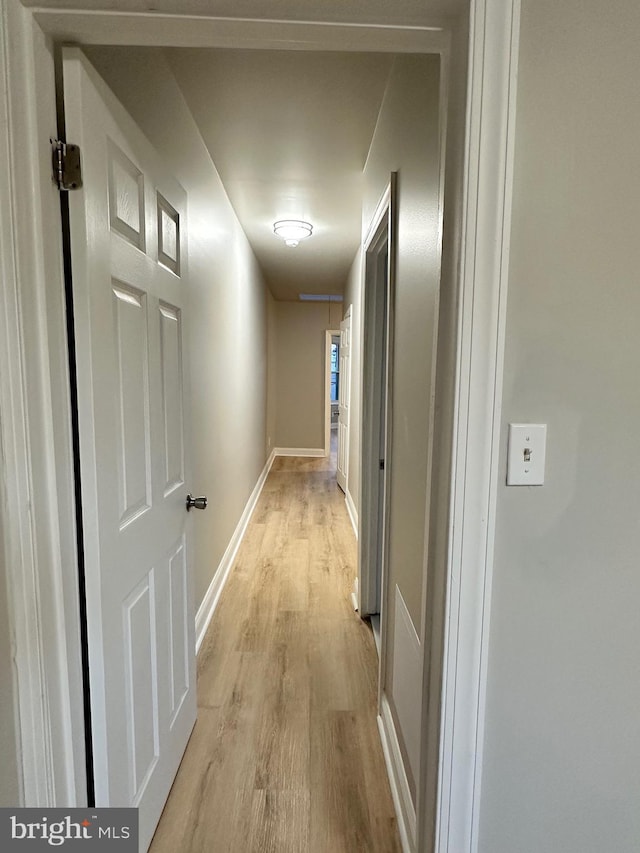 hallway featuring light hardwood / wood-style flooring