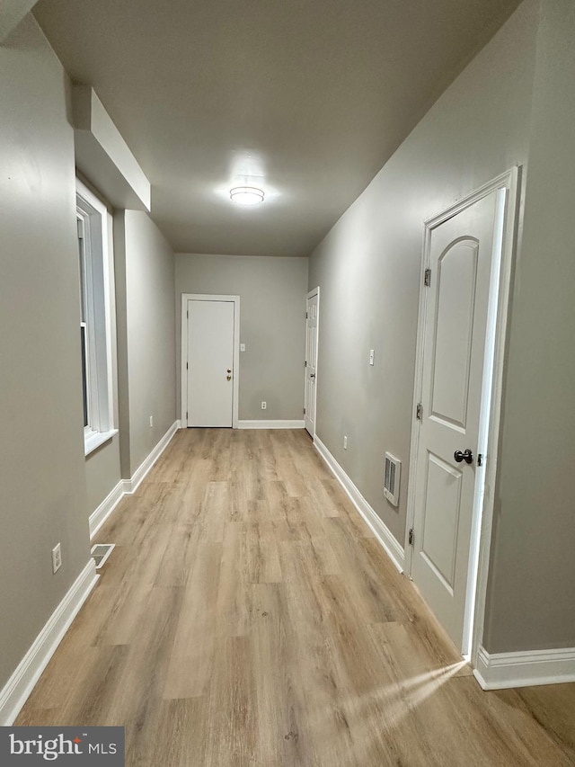 interior space with light hardwood / wood-style flooring