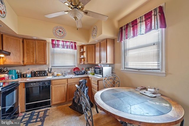 kitchen with tasteful backsplash, ceiling fan, and black appliances