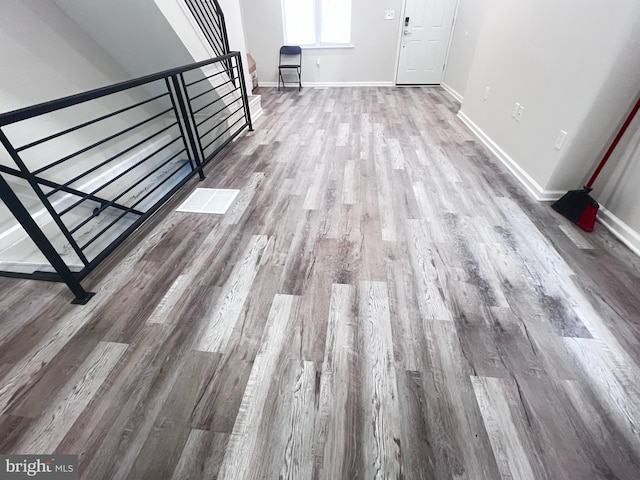 details with wood-type flooring