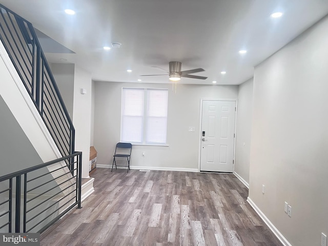 entrance foyer featuring ceiling fan and hardwood / wood-style floors