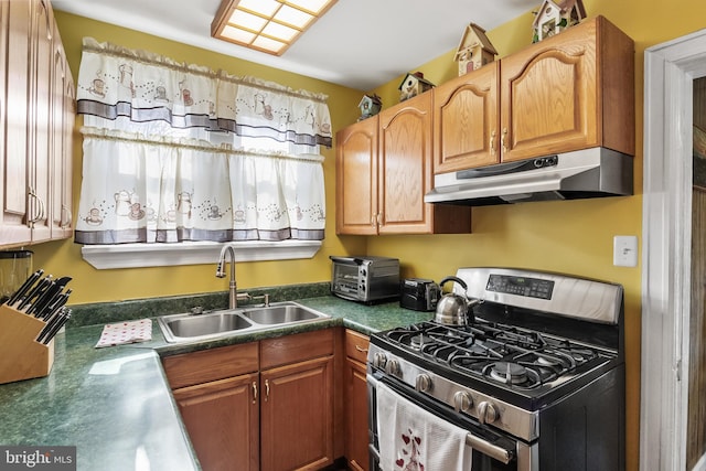 kitchen featuring sink and stainless steel range with gas cooktop