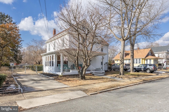 view of front of property featuring covered porch