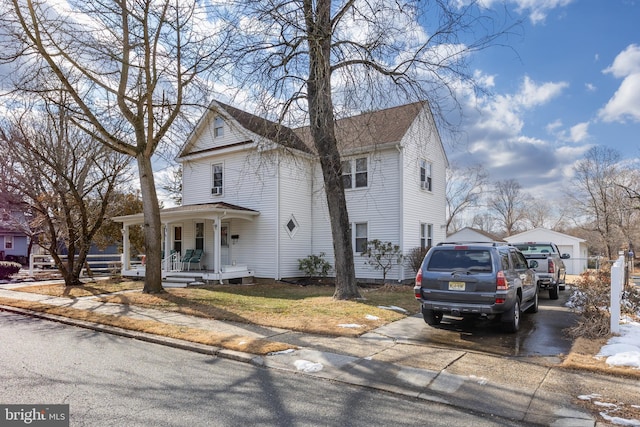 view of front of property featuring covered porch