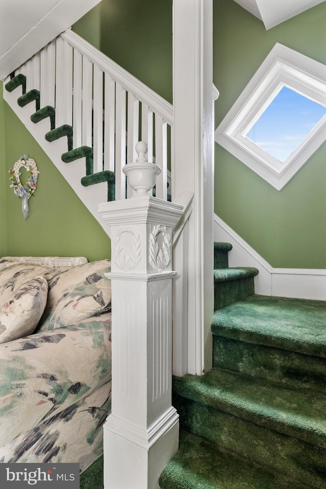 stairway with a skylight