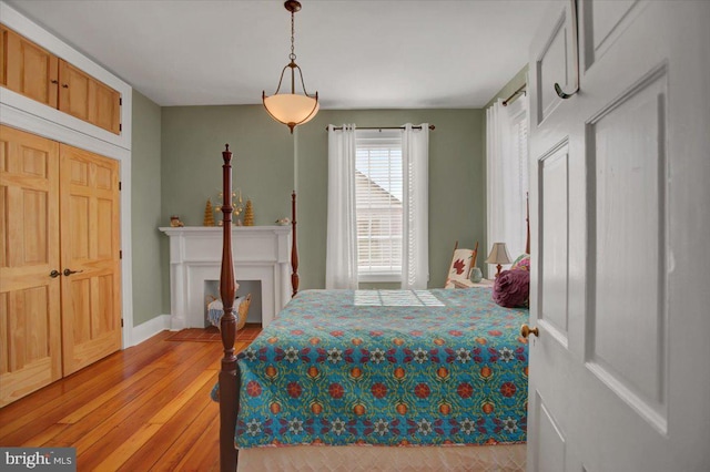 bedroom with light hardwood / wood-style flooring