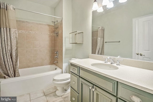 full bathroom with vanity, tile patterned floors, toilet, and shower / bath combo with shower curtain