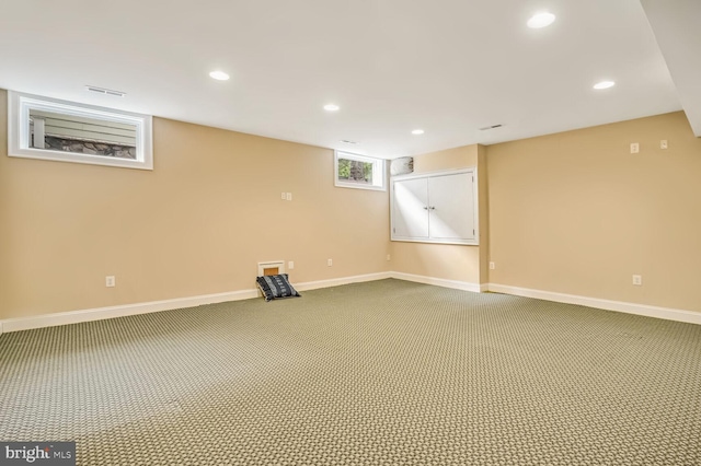 basement with carpet flooring