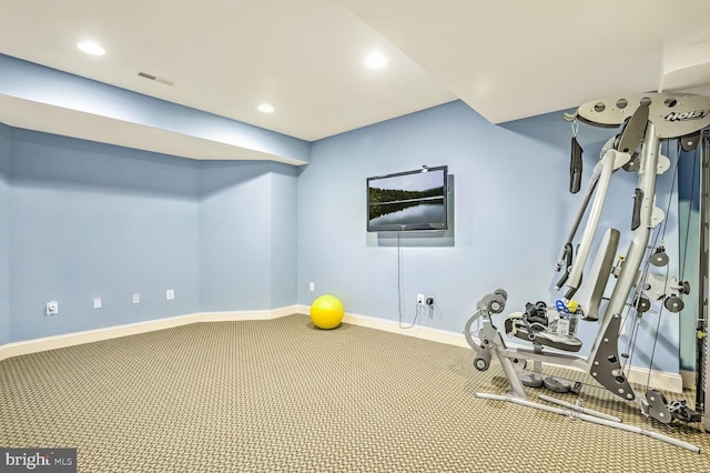 workout area featuring carpet