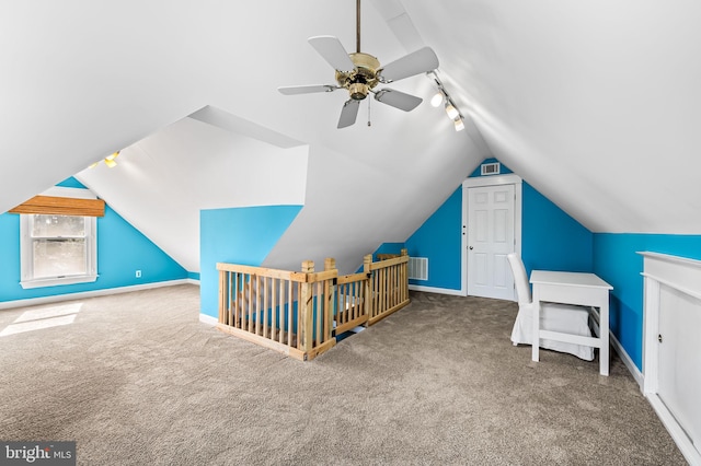 bonus room with carpet floors, lofted ceiling, visible vents, and baseboards