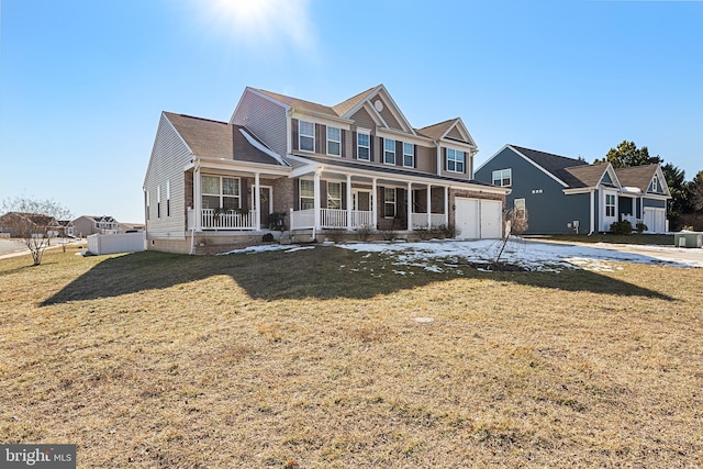 view of front of house featuring a front yard and covered porch