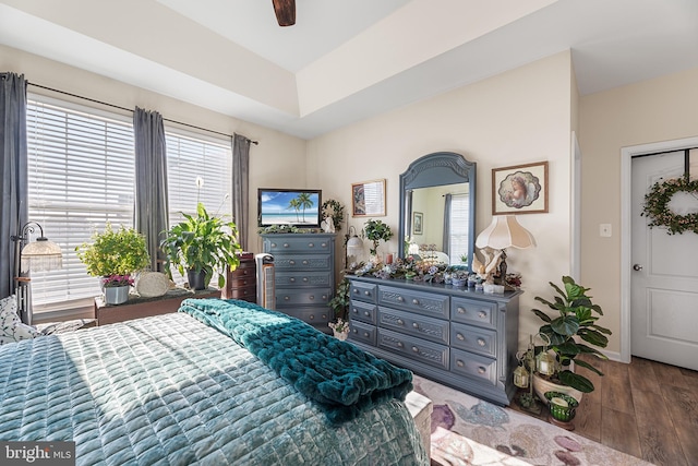 bedroom featuring hardwood / wood-style flooring and ceiling fan