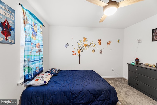 bedroom featuring ceiling fan and carpet flooring