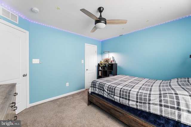 carpeted bedroom with ceiling fan