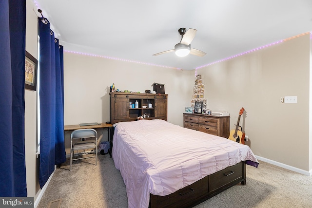 carpeted bedroom with ceiling fan