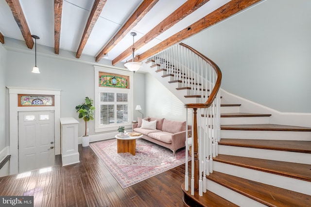 living room featuring beam ceiling and dark wood-type flooring