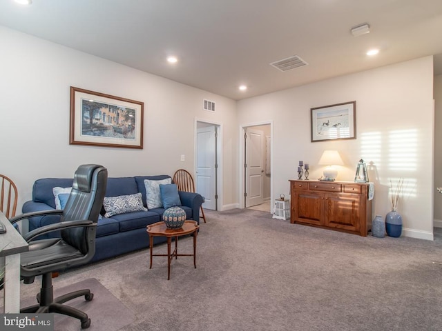 office area featuring light colored carpet