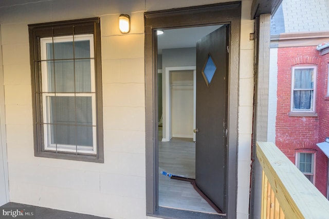 entrance to property with concrete block siding