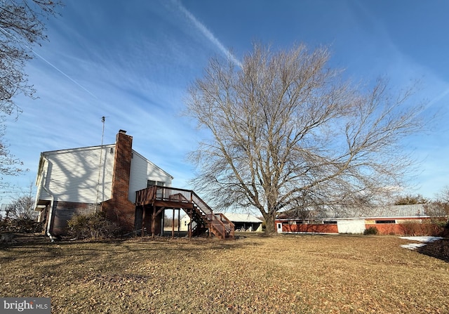 view of yard with a deck