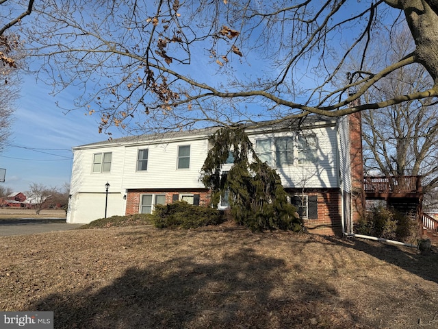 view of front of property with a wooden deck