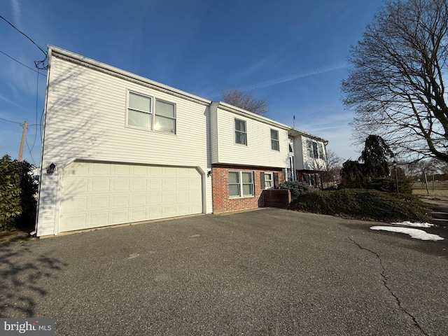 exterior space featuring a garage