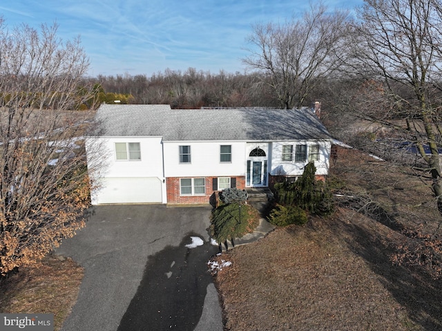 raised ranch with a garage